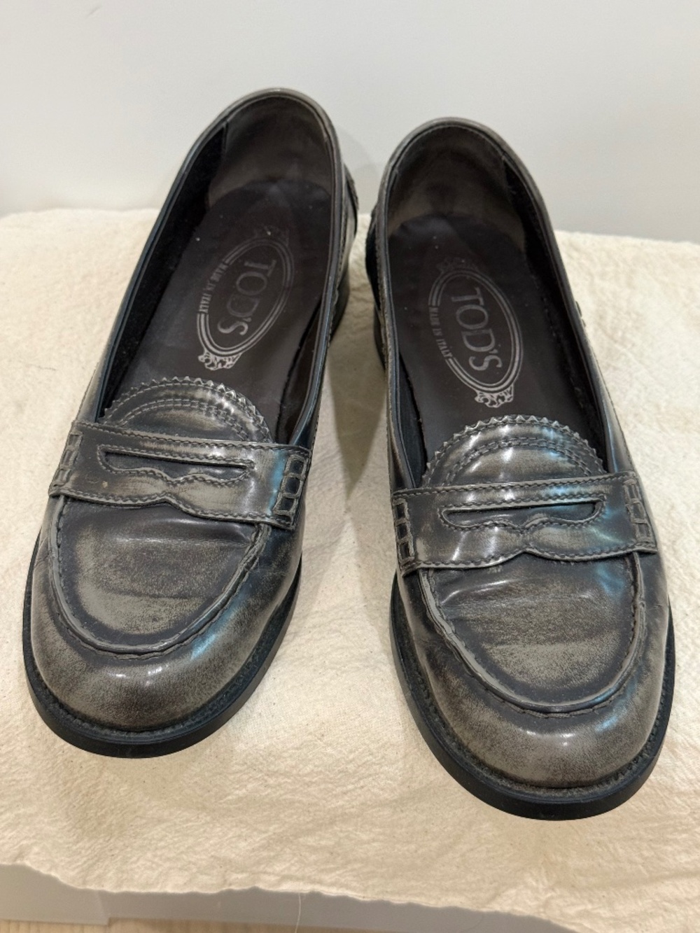 Todd’s patent grey distressed penny loafers